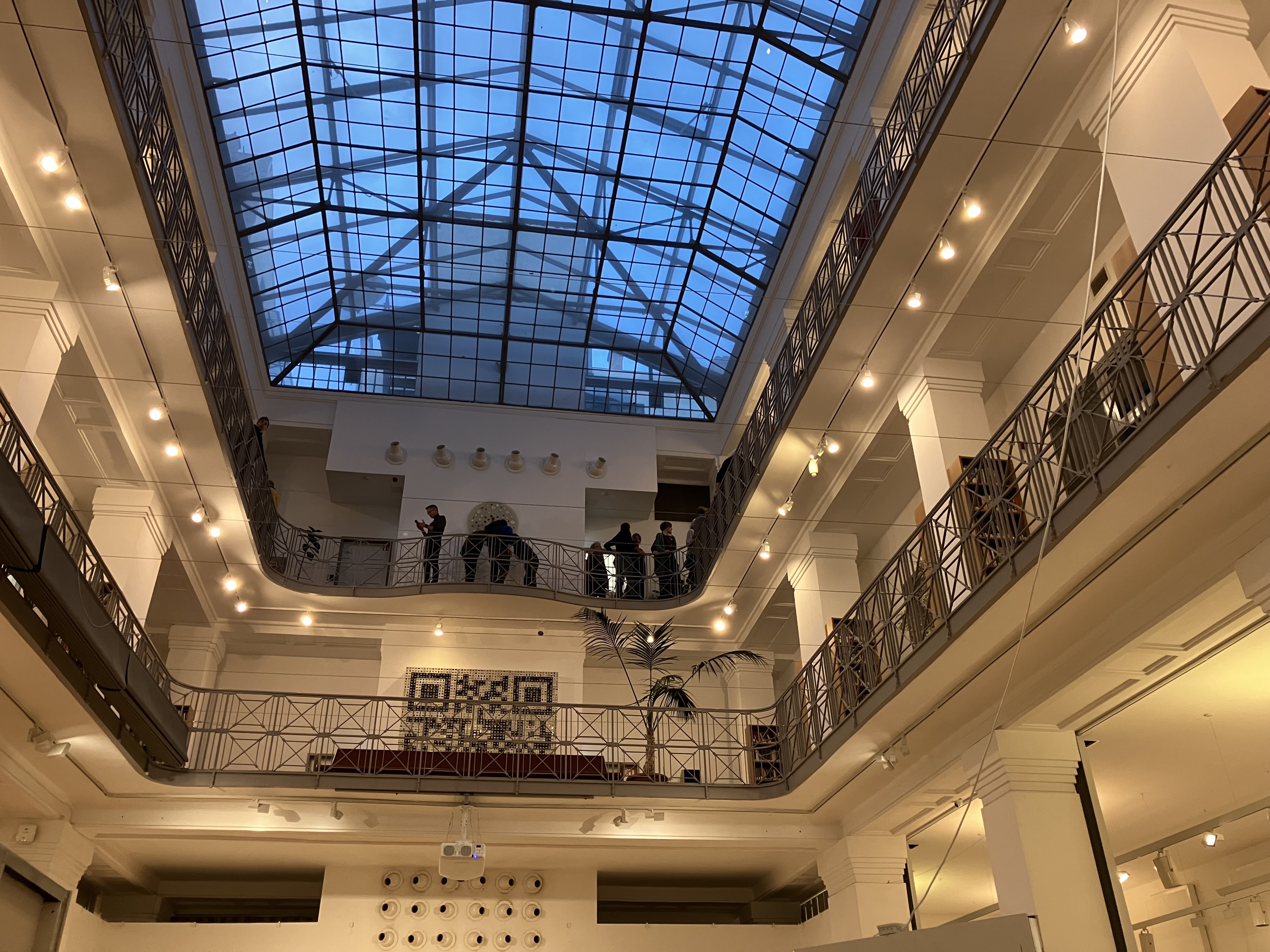 Curators Lenke Sziágyi and Zsuzsa Zádori standing in front of the exhibition.