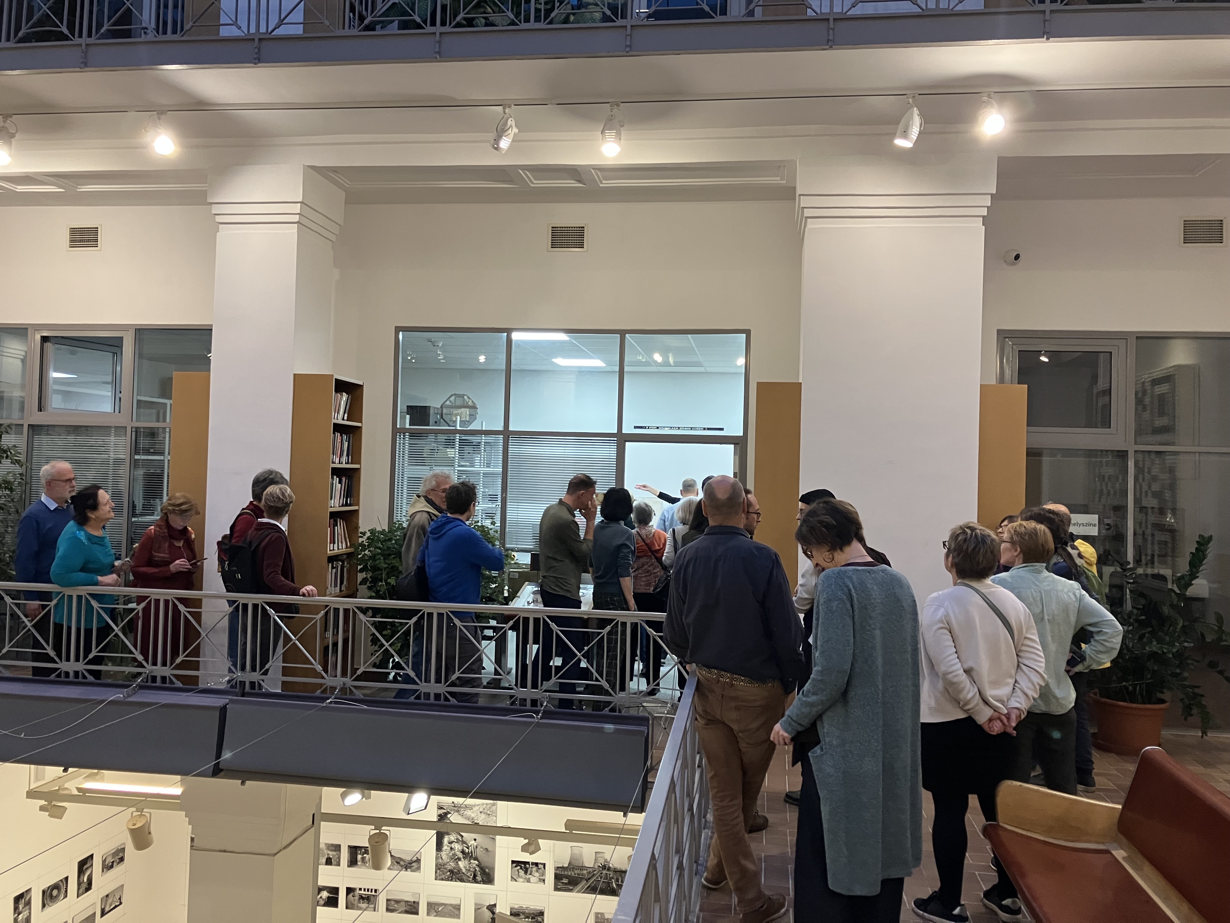Curators Lenke Sziágyi and Zsuzsa Zádori standing in front of the exhibition.